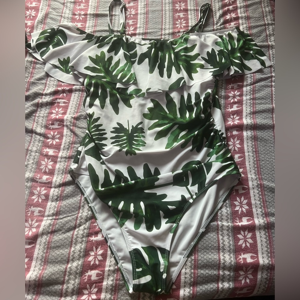Safari themed bathing suit only wore once in good condition no tags